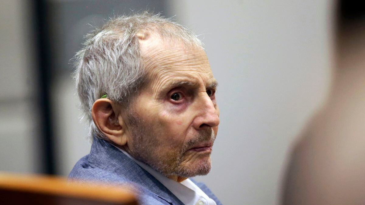 FILE - In this March 10, 2020, file photo, real estate heir Robert Durst looks over during his...