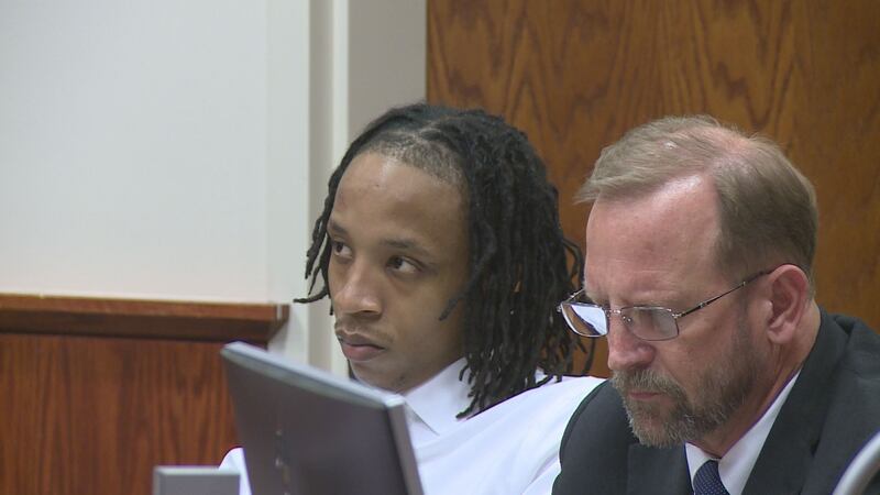 Deontae Rush sits with his attorney, Jeff Pickens, during opening arguments