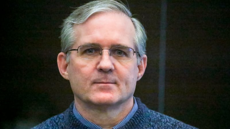 FILE - Paul Whelan, a former U.S. marine who was arrested for alleged spying, listens to the...